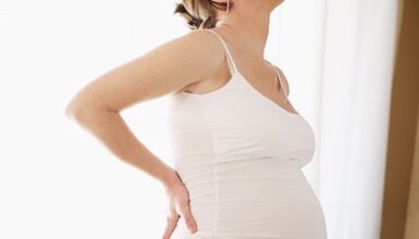 Pregnant Woman Back Pain Cropped.jpg