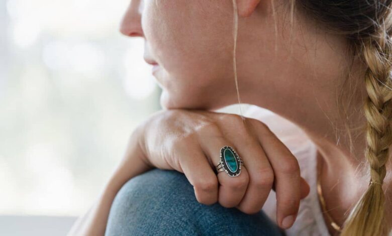 Woman With Braided Hair Thoughtful Pose.jpeg