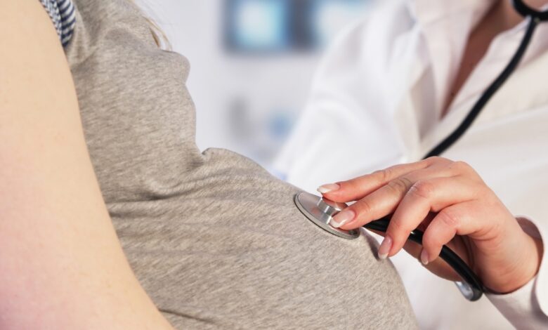 Doctor Examining A Pregnant Woman.jpeg