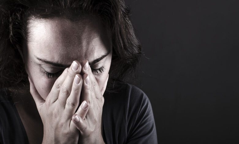Shutterstock 155806436 Woman Sad Depressed Panic.jpg