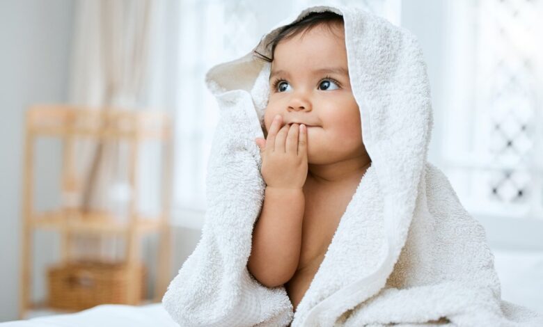 Shot Of An Adorable Baby Covered In A Towel After Bath Time 1366097101 1228x857.jpeg